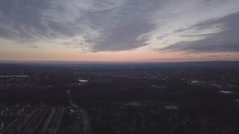 time lapse of small town at sunset