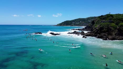 surfing lineup at byron bay in australia - drone 4k