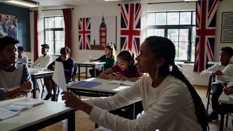 classroom scene of diverse students in a classroom with british flags