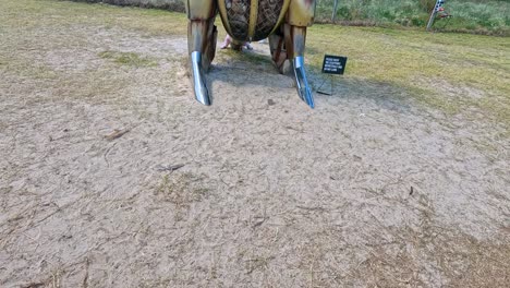 a kangaroo car statue on display at the beach