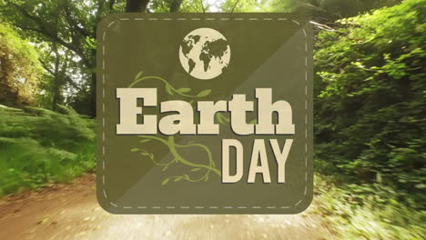 animation of earth day text over forest