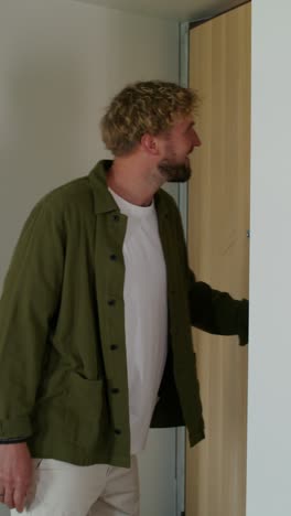 person receiving a package at the door