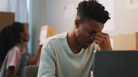 frustrated, stress and black man on laptop