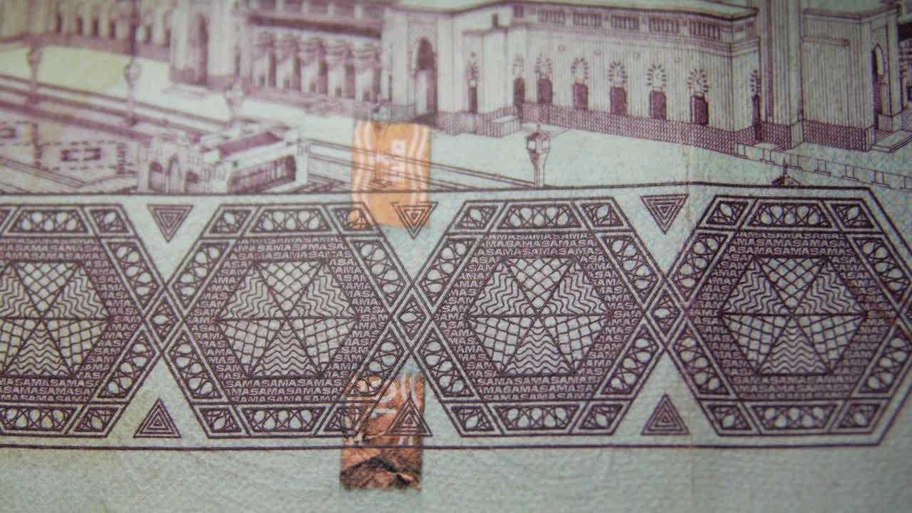 This is the Macro view of a normal paper bank not- money- currency ofSaudi Arabia 100 Riyals bill