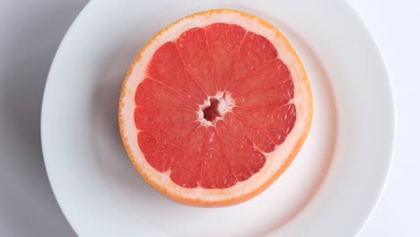 ripe and juicy grapefruit. red grapefruit on white background