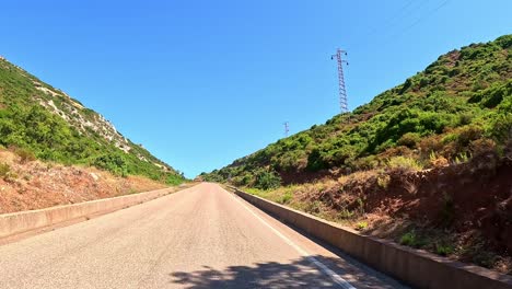 Lonely-secluded-countryside-road-through-heart-of-Sardinia,-point-of-view