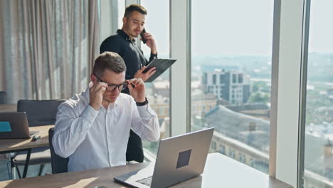 business colleagues working in modern office