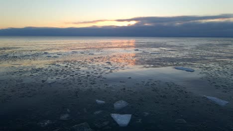 pieces of ice floting on lake superior, winter morning