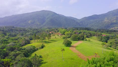 view of jarabacoa town and surrounding landscape of lush foliage and ridges in dominican republic