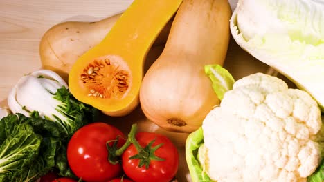 assorted vegetables displayed on a black background