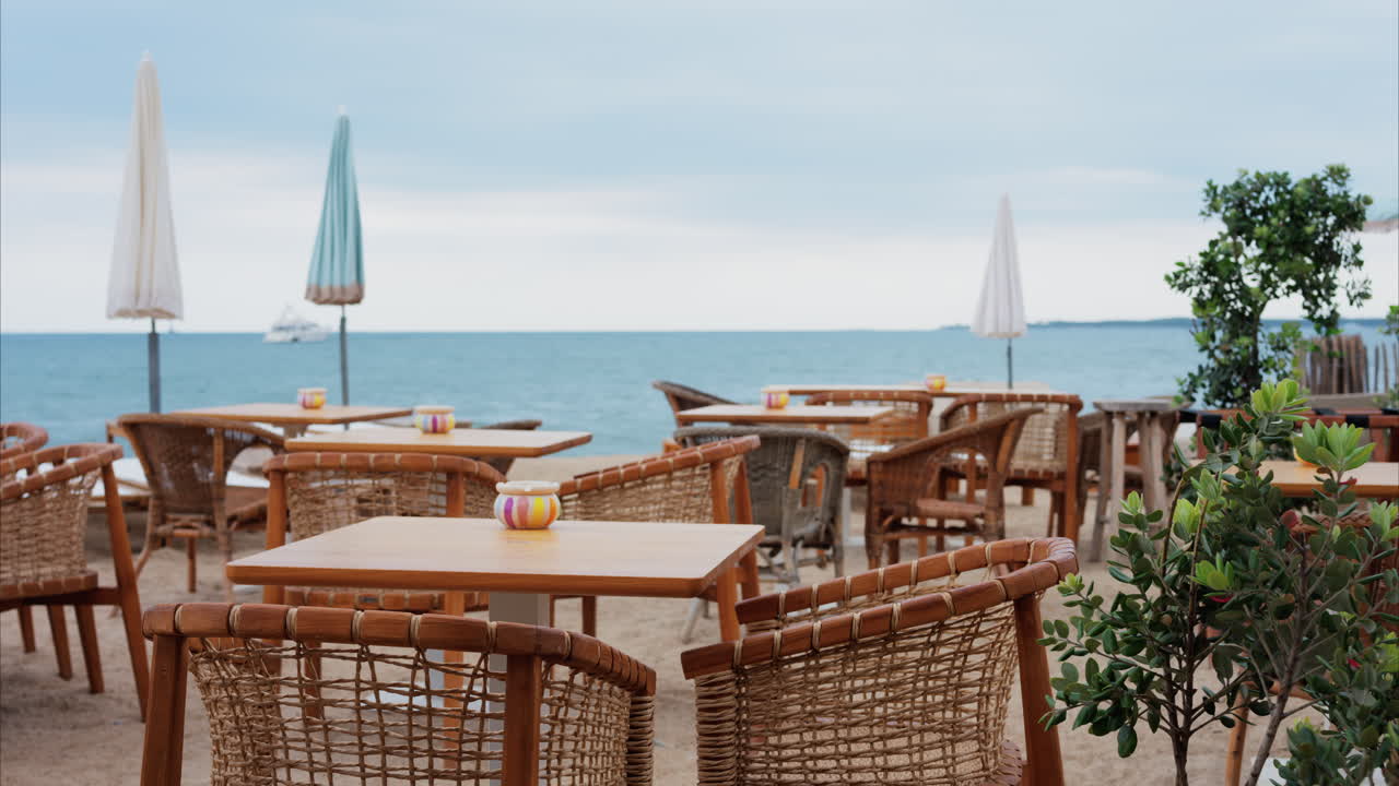 Empty tables at a beach terrace in the evening