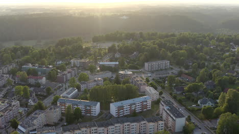 Cinematic-view-above-city-in-sunset