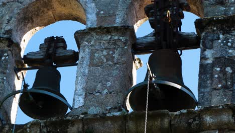 San-Martino-de-Alongos-Church-Bell-Detail,-Toen,-Spain