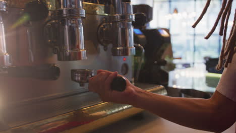 animation of light spots over biracial man preparing coffee in cafe