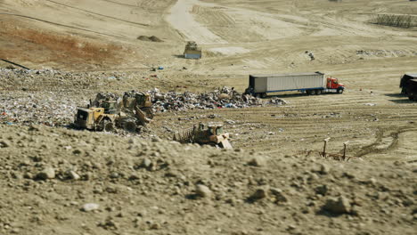 heavy machinery working at a landfill site