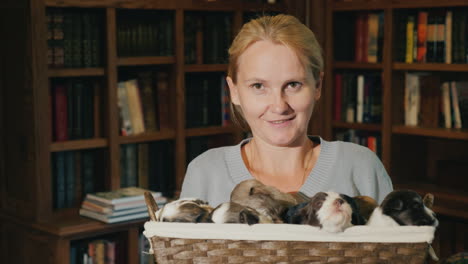 Portrait-Of-A-Woman-With-A-Basket-Full-Of-Little-Puppies