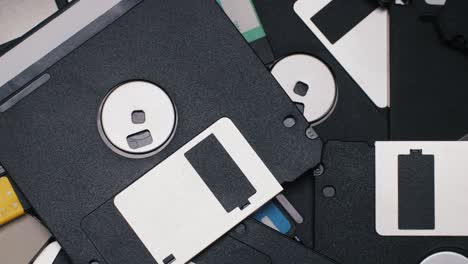 pile of vintage floppy disks