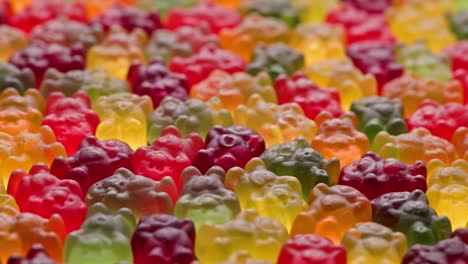 full frame looped spinning background of colorful jelly bear candies