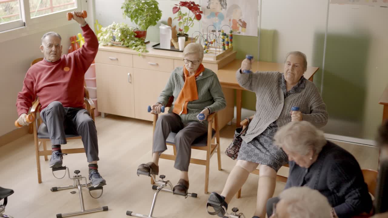 Group of seniors exercising in a nursing home