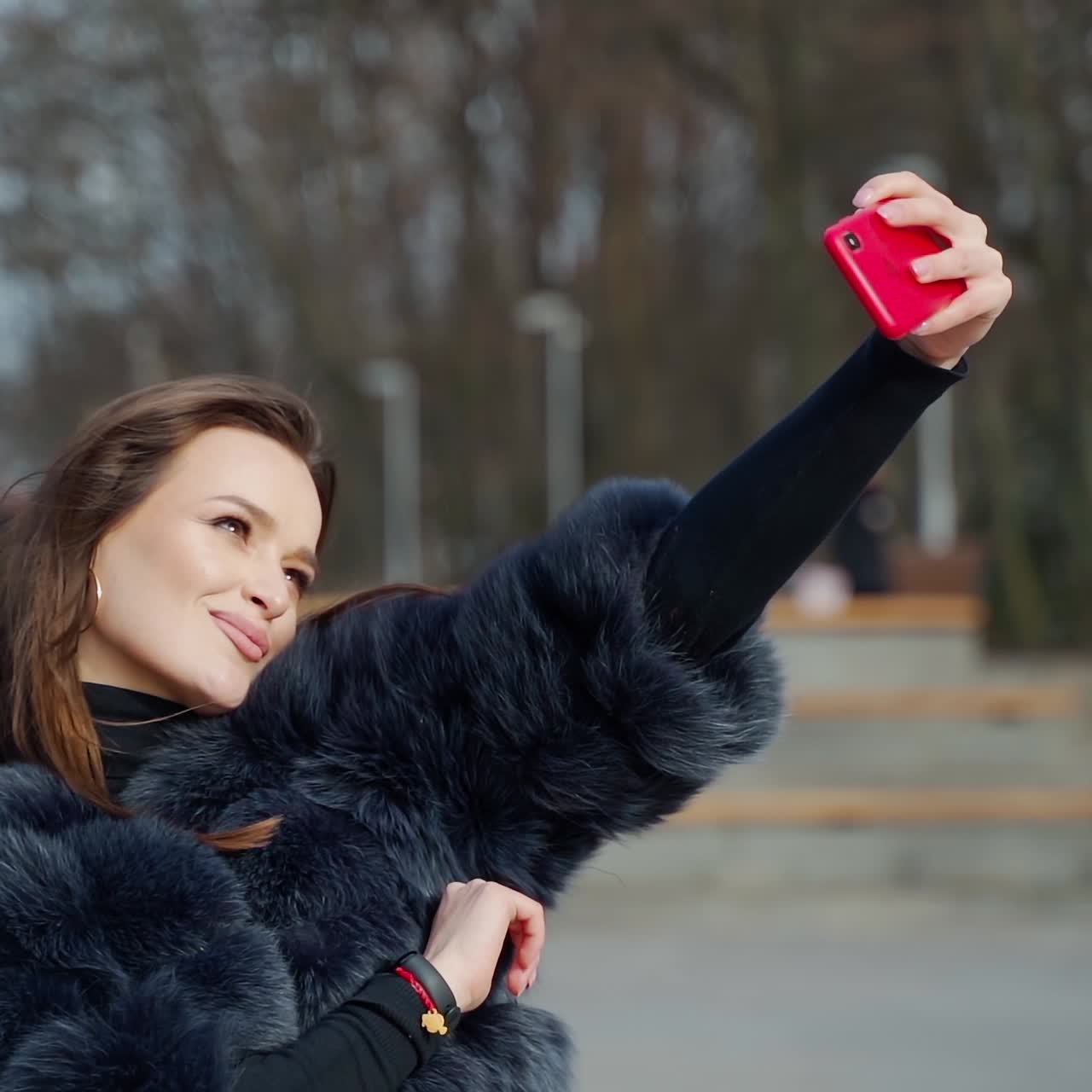 Girl with smartphone in hand