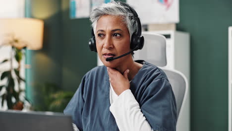 woman wearing headset at work