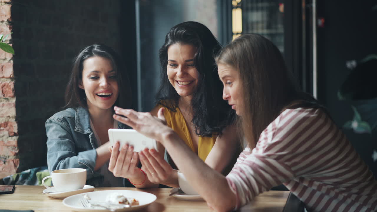 Friends Enjoying Time Together in Cafe