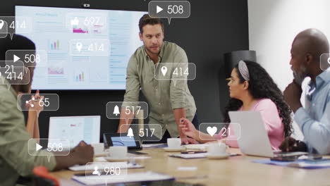 animation of notification bars over diverse man explaining reports to coworkers on big screen