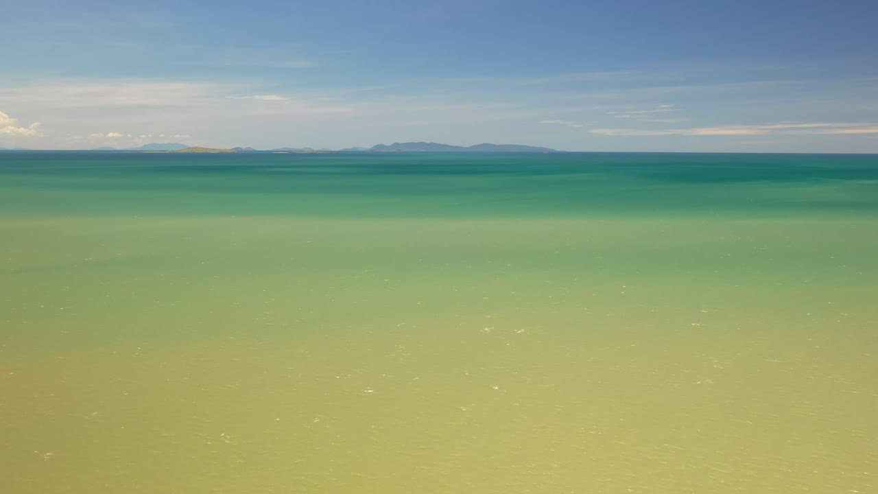 Serene Seascape: Tropical Island and Calm Ocean