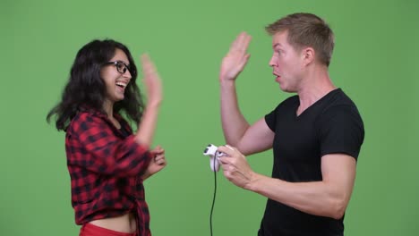 young couple playing games together