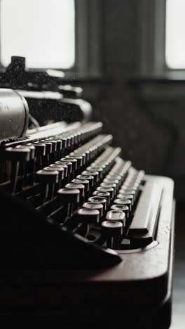 vintage typewriter in a dusty room