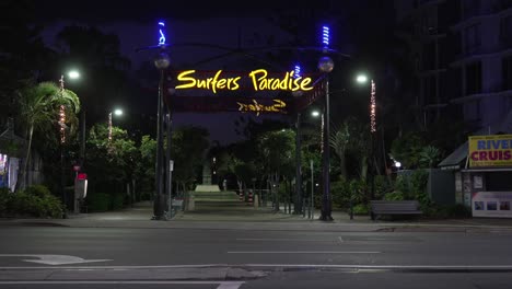 gold coast city in australia at night, surfers paradise yellow neon sign