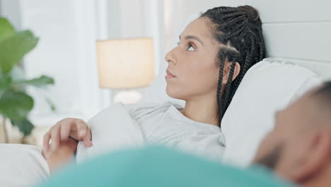 Woman,-insomnia-and-thinking-in-bedroom