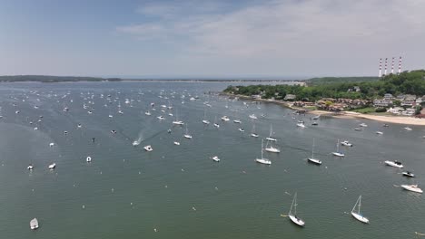 an aerial view over the northport marina on long island, ny with many anchored boats