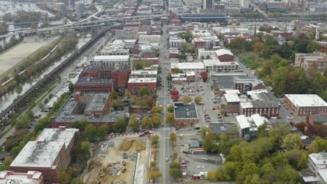 drone flying over shockoe bottom in downtown richmond, virginia in the afternoon