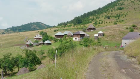 aerial view of old traditional houses at sopotnica village on jadovnik mountain in serbia - aerial drone shot