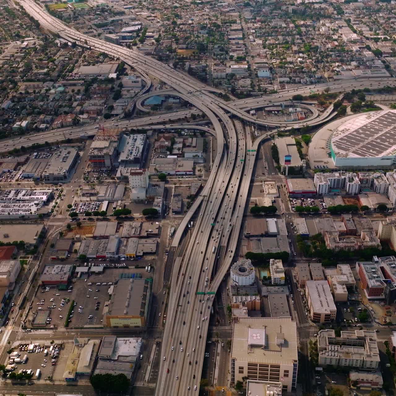 Huge road crossings at the multi-lane freeways of Los Angeles, California, USA. Amazing urban panorama with crazy traffic. Aerial view