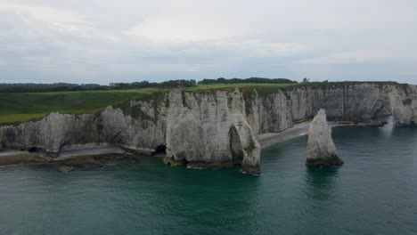 drone shot of the cliffs of etretat in france