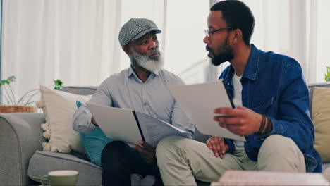planning, father and son with paperwork