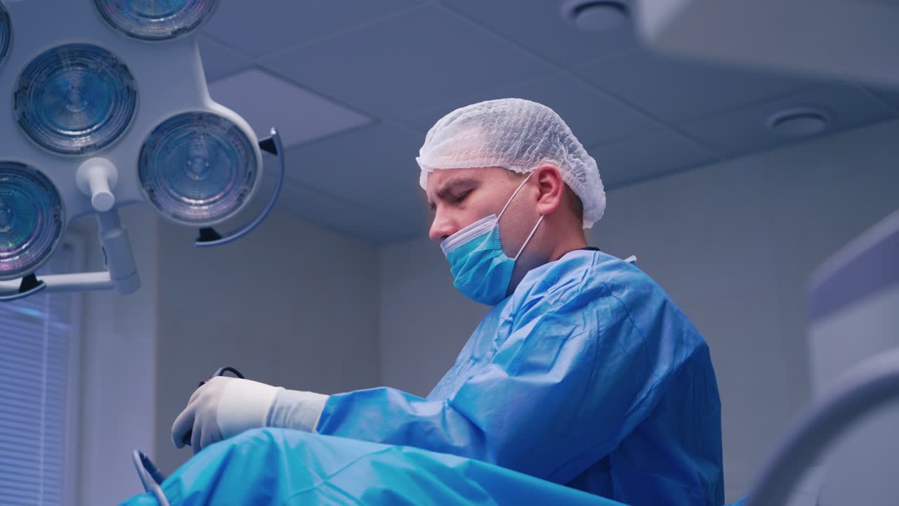 Surgeon operating live shot. Surgeon doctor during operation process in surgery