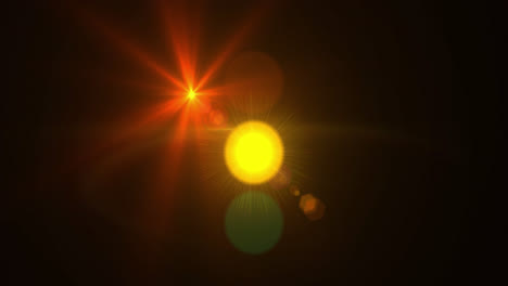 manchas brillantes de luz contra un fondo negro