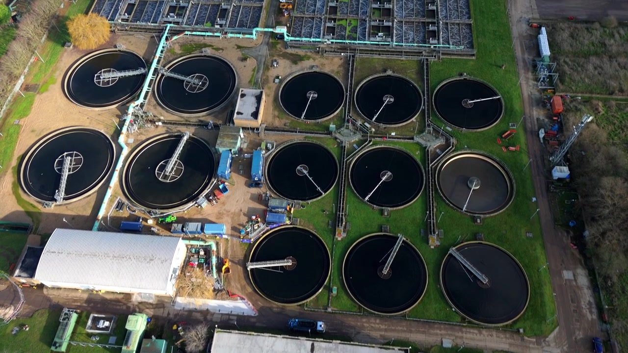 Aerial view of an anaerobic digestion facility for renewable energy at a wastewater plant.