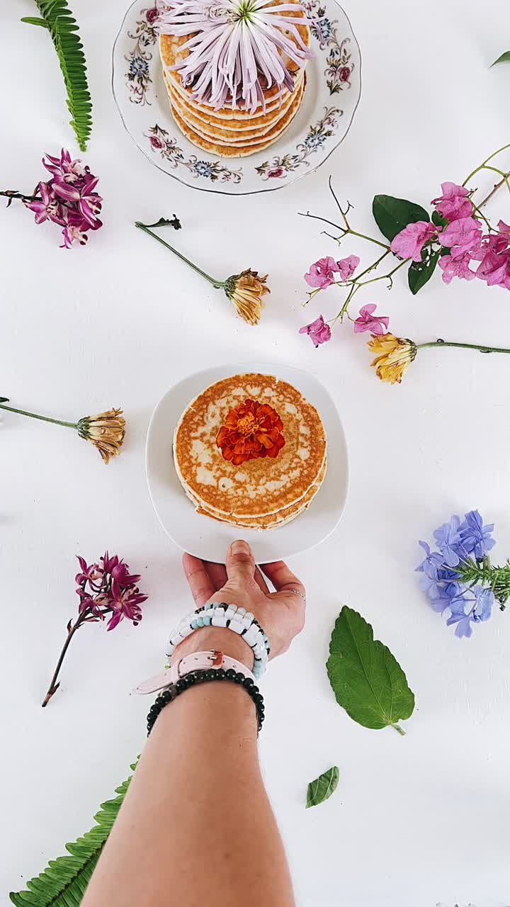 Delicate Pancakes and Floral Arrangement