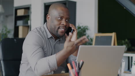 businessman having a phone call in the office