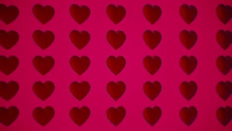 patrón romántico con corazones rojos poligonales. para el evento del día de san valentín. animación de bucle 4k. renderizado en 3d animación bucleable 4k