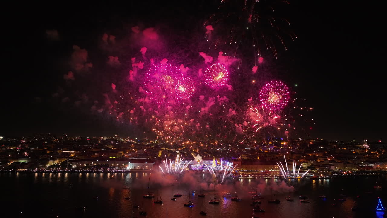 Aerial view of the Lisbon city skyline and New Years eve fireworks in Portugal