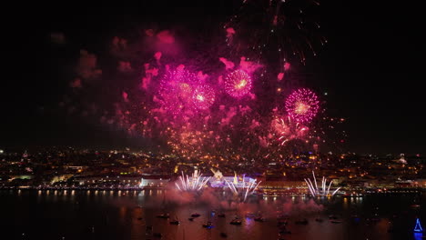 aerial view of the lisbon city skyline and new years eve fireworks in portugal