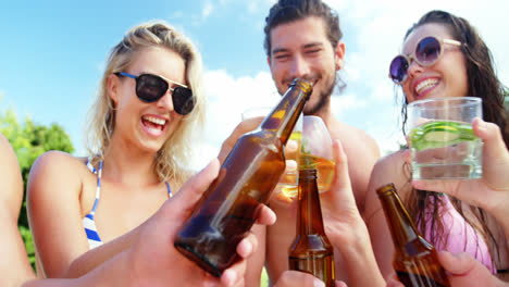 Group-of-friends-having-fun-at-poolside