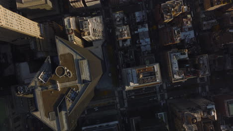 Aerial-birds-eye-overhead-top-down-view-of-regular-blocks-of-buildings-in-city.-Fly-above-high-rise-office-of-apartment-buildings.-Manhattan,-New-York-City,-USA