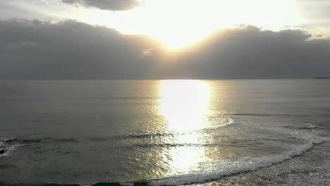 Aerial-shot-of-the-sun-setting-over-the-coastline-of-bass-coast-Victoria-Australia