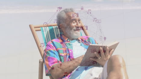 elderly man reading on beach with digital network animation overlay